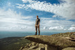© venerala - a man stands in the mountains