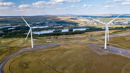 Wall Mural - Large wind turbines on a rural hillside in Wales (Tredegar)