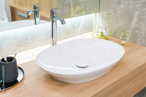 Cuadros en Lienzo Interior of bathroom with sink basin faucet and mirror