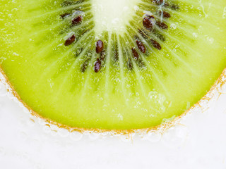 Wall Mural - Close up texture background Kiwi fruit