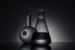 © dohee - experiment equipment plike on the black background.