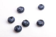 Many Blue Berry On The Wood Table, Whitebackground.