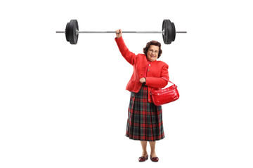 Poster - Senior lady lifting a barbell with one hand