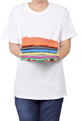 Wall Mural - Man holding stack of folded clothes in his hand