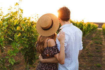 Poster - Loving couple outdoors hugging with each other.