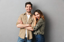 Portrait of a cheerful young couple standing together