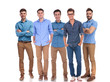 © Viorel Sima - five young casual men standing together at work