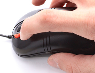 Computer mouse and hand closeup on white background