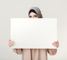 Islamic Woman With Blank Board On White