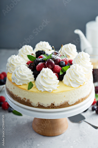 Fotografie, Obraz Classic New York cheesecake decorated with whipped cream
