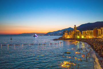 Stella Maris traditional celebration. During the night when thousands of tiny lit candles are left on the water from the boats or from the beach in Camogli, Genoa (Genova) province, Italy.