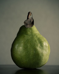 Green Pear On Grey Background