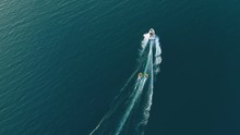 Aerial View Of Boat Water Tubing On Torch Lake In Northern Michigan