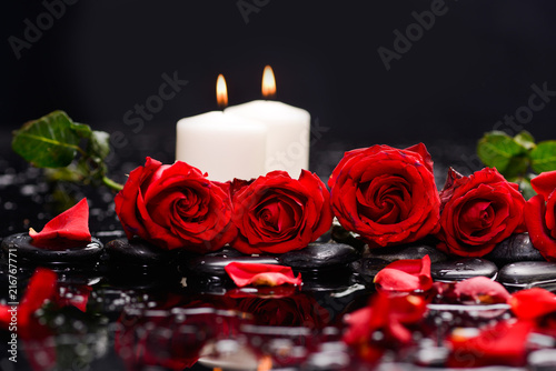 Fotografering Still life with red rose ,petals with candle and therapy stones