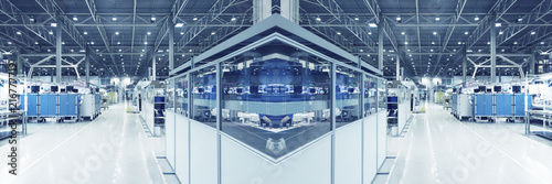 Fotomural Blue toned, blurred collage of as if typical industrial space
