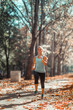 © Microgen - Woman Jogging Outdoors in The Fall