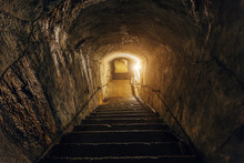 Dark Corridor Of Old Abandoned Underground Soviet Military Bunker. Staircase Goes Down 