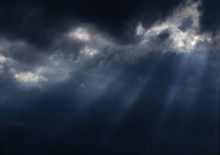 The Sun's Rays Penetrate The Clouds