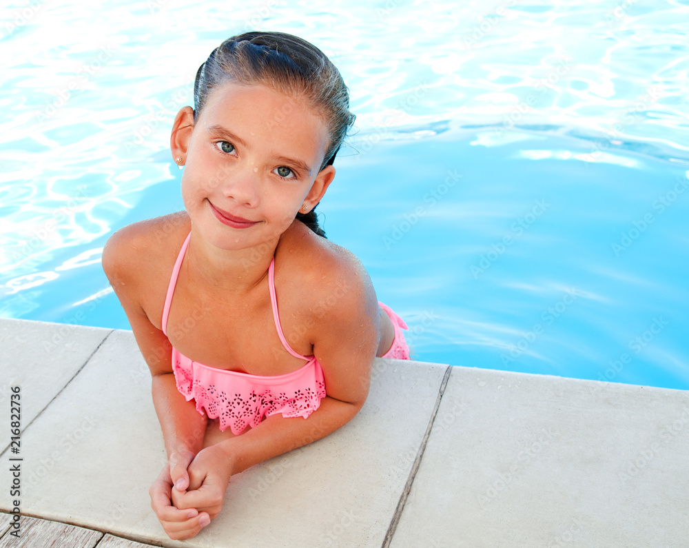 Cute smiling happy little girl child in swimming pool Stock Photo ...