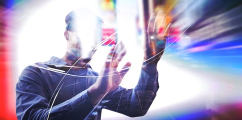 Poster - composite image of man using a virtual reality device