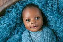 Newborn Baby Boy Swaddled In Blue