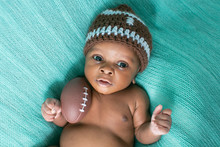 Newborn Baby Boy With Football