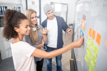 Designers drawing website ux app development.