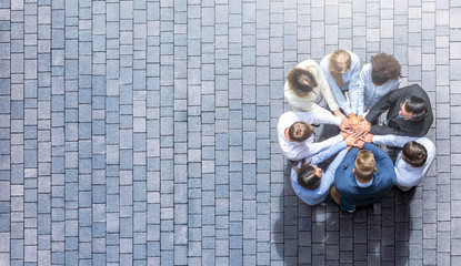 Wall Mural - Stack of hands. Unity and teamwork concept.