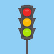 Traffic light isolated icon. Green, yellow, red lights vector illustration on blue sky background. Road Intersection, regulation sign, traffic rules design element.