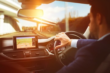 Poster - Man diving car with navigation system 