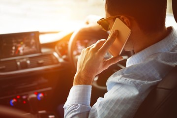 Poster - Close-up of man calling while driving 