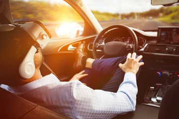 Poster - man behind the wheel wearing a virtual reality helmet