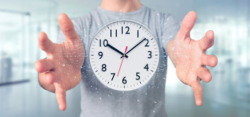 Poster - Man holding a clock timer 3d rendering
