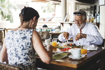 Couple eating a hotel breakfast