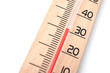 © pixarno - closeup of wooden thermometer on white background
