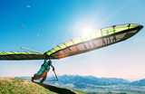 Hang glider launch from top of hill