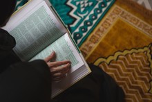 Muslim Woman Reading Holy Quran