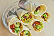 Colorful of Burrito roll close up  wrap with aluminum foil.