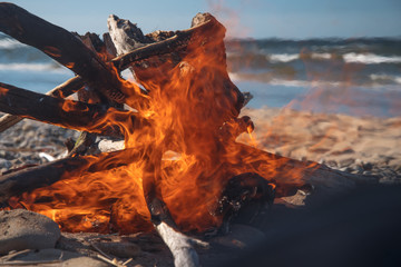 Poster - fire burns near the sea