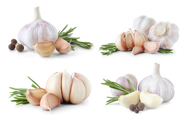 Set of different garlic bulbs and cloves on white background