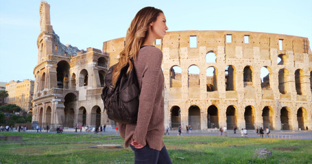 Wall Mural - Happy attractive Caucasian woman sightseeing in Rome