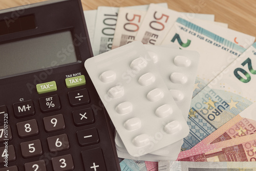 Health Care Medical Or Pharmacy Cost Concept White Package Of Health Care Medical Or Pharmacy Cost Concept White Package Of Pills On Pile