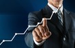 © BillionPhotos.com - Businessman and  growing line, symbolize growing Skills