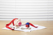 © dohee - pink pig coin bank with a financial paper, coin, ribbon at the office