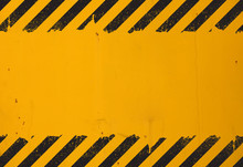 Yellow Background With Black Grunge Hazard Sign