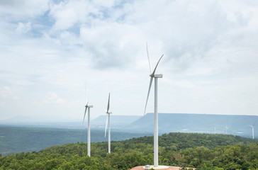 Wall Mural - white wind turbines generating electricity in wind power station at lam takhong reservoir dam, nakho
