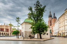 View Of The Catholic Church Of Mary And The Church Of St. Adalbert On The Main Square Of Krakow On A Rainy Day