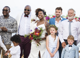 Happy bride and groom in a wedding ceremony at a tropical island