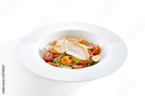 Fotografía Caesar Salad with a Crispy Chicken Isolated