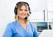 © JackF - Ready to help specialist medical call center in headphones with microphone